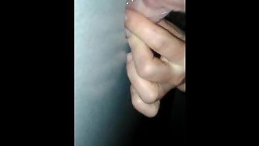 Hot wife sucking and fucking a small dick at the gloryhole